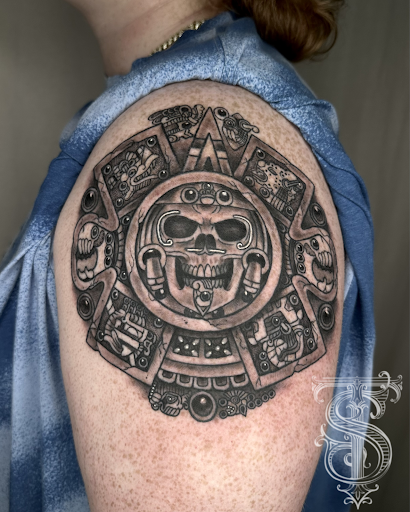 Explore lion tattoo ideas for guys, creative tattoo ideas in Lakeview, available at Backwoods Tattoo Studio