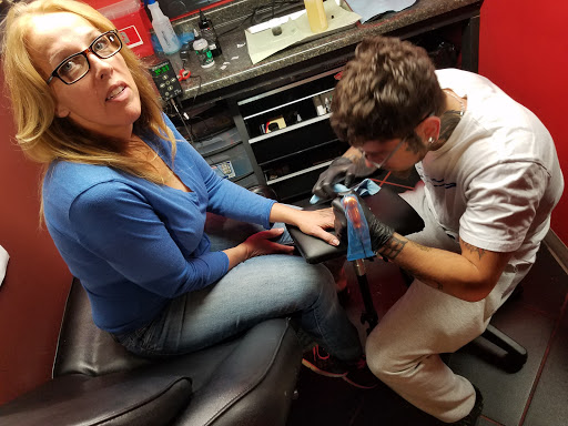 Tattoo Shop «Quality Ink -Tattoo and Piercing Studio», reviews and photos, 3604 Fort Crook Rd S, Bellevue, NE 68123, USA