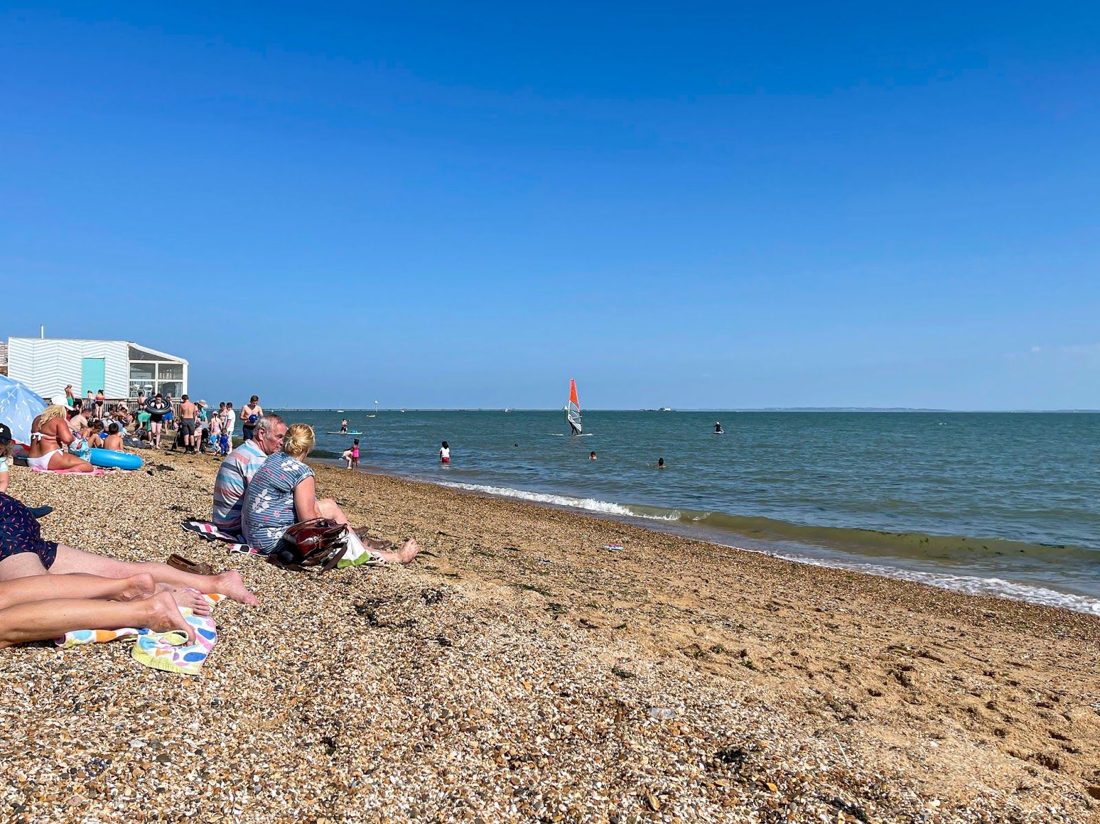 Photo of Westcliff beach with blue pure water surface