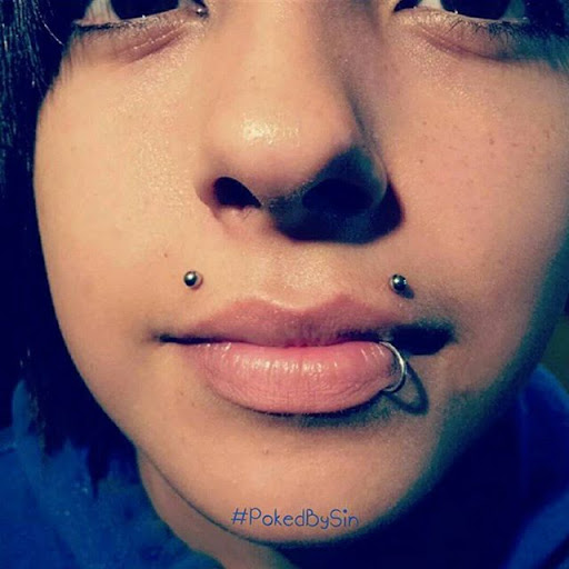 Explore cleavage tattoo ideas, creative tattoo ideas in Fremont, available at Inkies Tattoo Studio