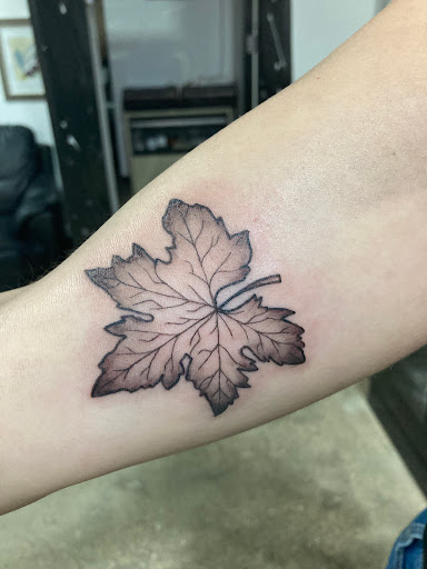 Explore astrology tattoo ideas, creative tattoo ideas in Arlington, available at Lady Octopus Tattoos