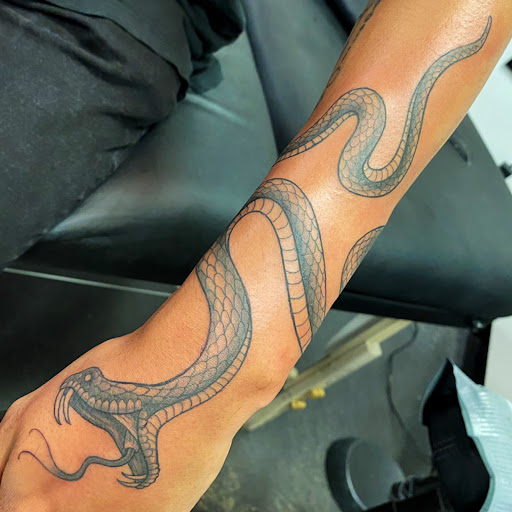 Explore stick figure tattoo ideas, creative tattoo ideas in Raleigh, available at Raleigh Tattoo Company