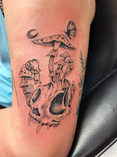 Find angel hand tattoo ideas for your next unique tattoo in Salem at Outwest Tattoo and body piercing ,30 years of tattooing,only life time guarantee