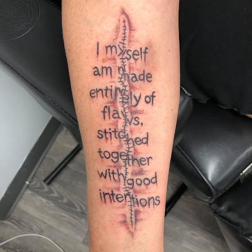 Explore guns and roses tattoo ideas, creative tattoo ideas in Westland, available at Premier Tattoo Company Westland