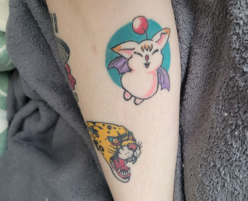 Explore flash art tattoo ideas, creative tattoo ideas in Utica, available at Red Raven Tattoo and Body Piercing