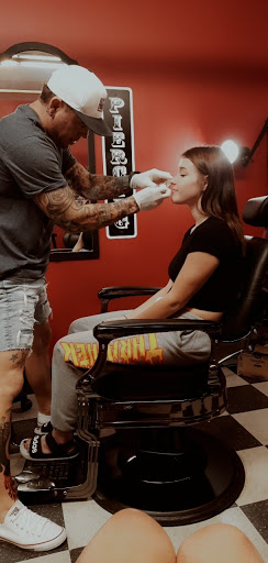 Explore family heart tattoo ideas, creative tattoo ideas in Washington, available at Angel & the Bad Man Tattoo