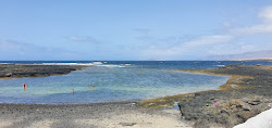 Playa de la Caleta de Caballo'in fotoğrafı küçük koy ile birlikte