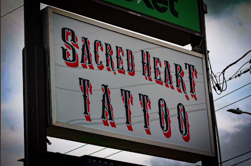 Explore raccoon tattoo ideas, creative tattoo ideas in Manchester, available at Sacred Heart Tattoos