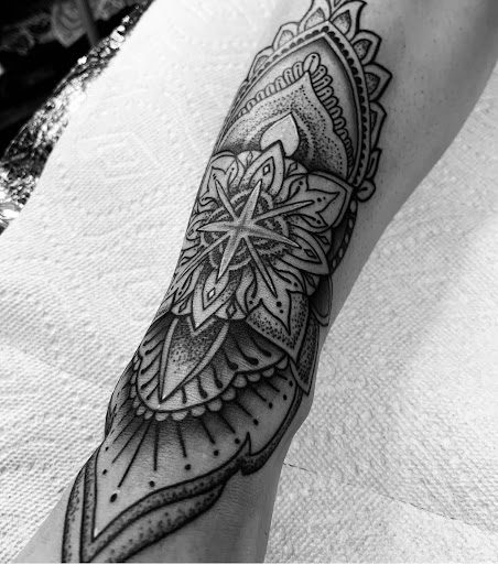 Explore dragon tattoo ideas for females, creative tattoo ideas in Saint Petersburg, available at Buku Tattoo Studio