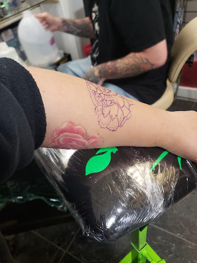 Explore cover up tattoos ideas forearm, creative tattoo ideas in Clovis, available at Ronster Tattoo Studios