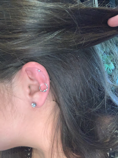 Explore red string tattoo ideas, creative tattoo ideas in Pensacola, available at Pensacola Tattoo Studio, Inc.