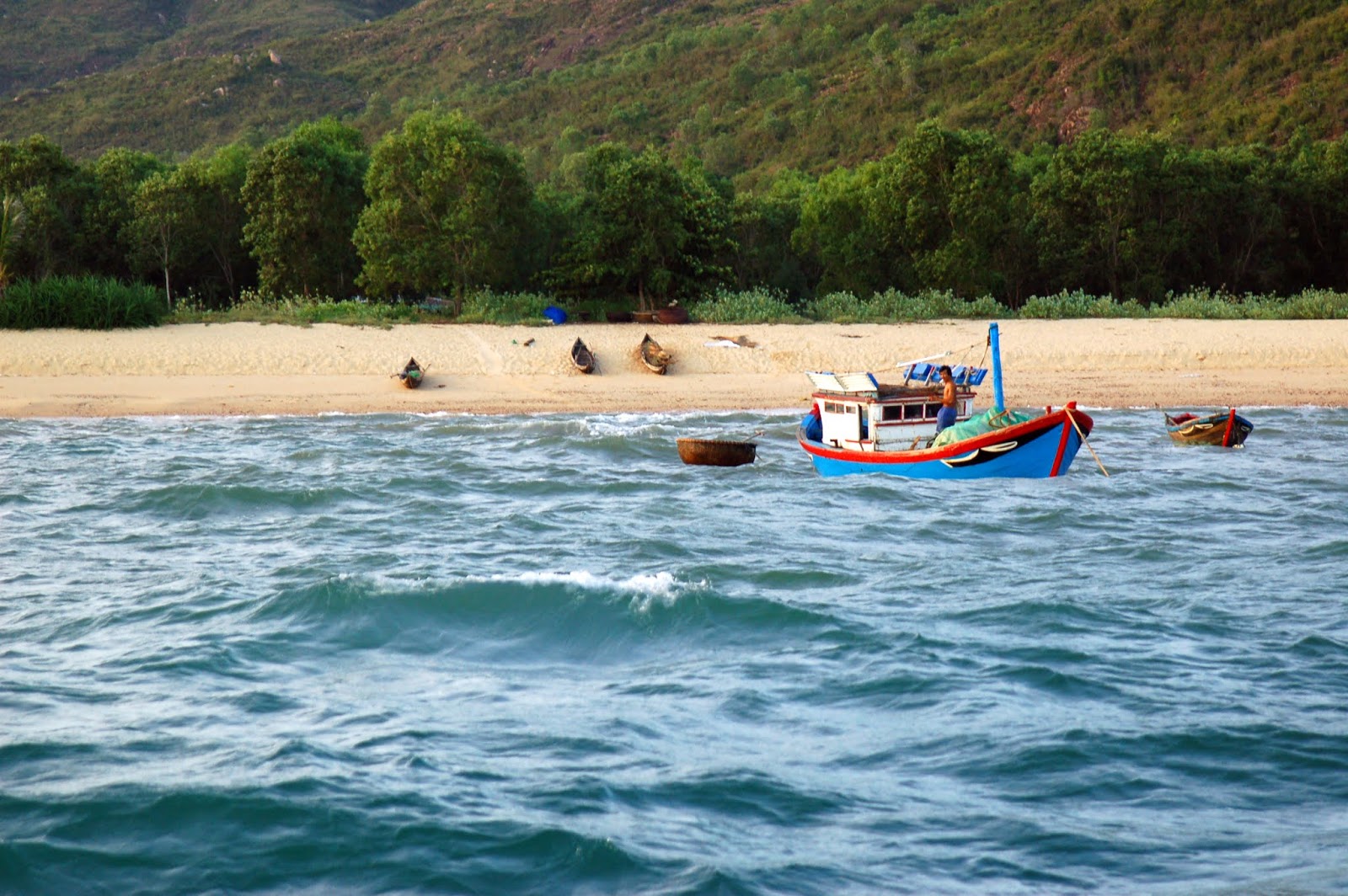 Foto van Rang Beach met turquoise puur water oppervlakte