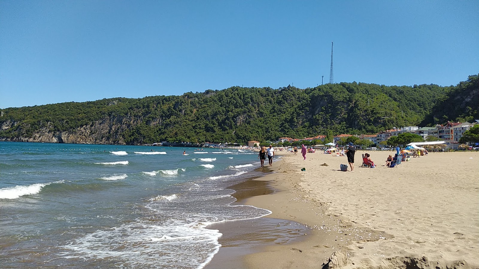 Foto von Inkumu Strand mit türkisfarbenes wasser Oberfläche