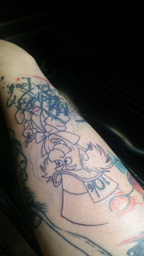 Explore silver lining tattoo ideas, creative tattoo ideas in Newark, available at Dark Woods Tattoo Studio