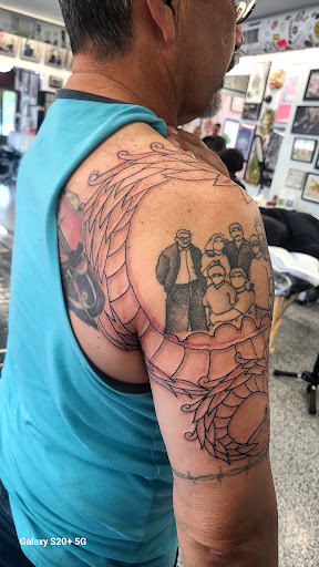 Explore zebra tattoo ideas, creative tattoo ideas in Orange, available at Fine Tattoo Work