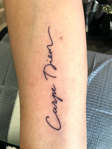 Explore hood neck tattoos ideas, creative tattoo ideas in Mount Clemens, available at Hand & Heart Tattoo