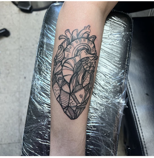 Explore forearm tree tattoo ideas, creative tattoo ideas in Marietta, available at Monkeys Uncle Tattoo