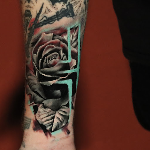 Explore thigh tattoo ideas for men, creative tattoo ideas in Nashville, available at RedBird Tattoo