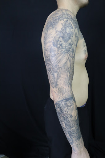 Explore line tattoo ideas for females, creative tattoo ideas in Des Moines, available at Skin Kitchen Tattoo