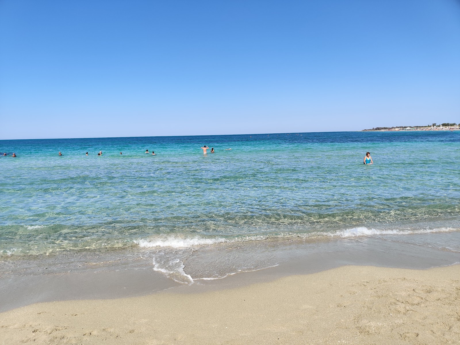 Spiaggia di Torre Mozza II'in fotoğrafı geniş plaj ile birlikte