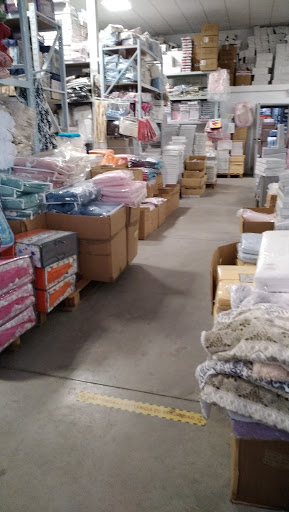 Expo Home Melilla SL venta al por mayor de colchas, sábanas, toallas (Polígono Guadalhorce, Málaga)