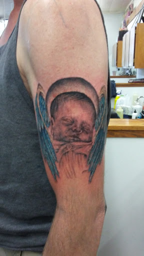 Tattoo Shop «Fine Line Tattoo», reviews and photos, 1915 SW Gage Blvd, Topeka, KS 66604, USA