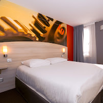 Chambres du Restaurant Brit Hotel Confort La Rochelle-Bistrot Les Temps Modernes à Perigny - n°6