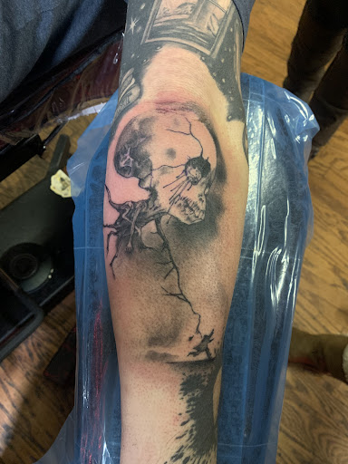 Explore jesus sleeve tattoo ideas, creative tattoo ideas in Cass City, available at Wolf Zen Tattoo