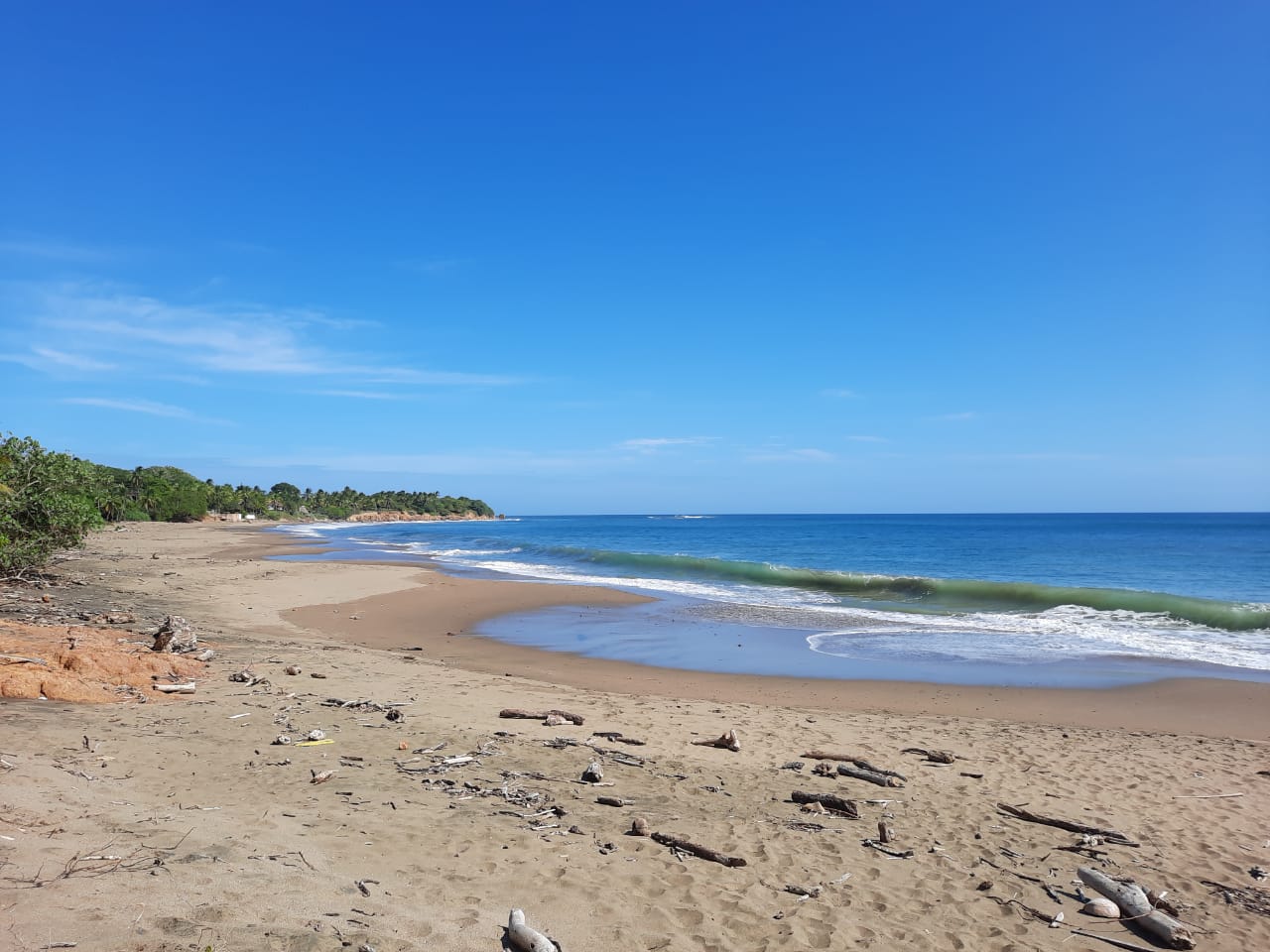Panamaes Beach的照片 带有明亮的沙子表面