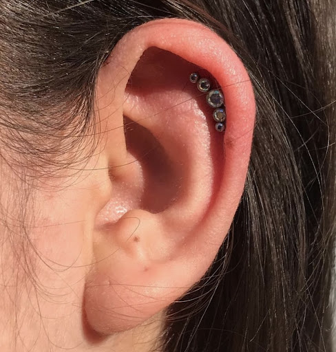 Explore circle tattoo cover up ideas, creative tattoo ideas in San Diego, available at Luna Studio Body Piercings & Tooth gems