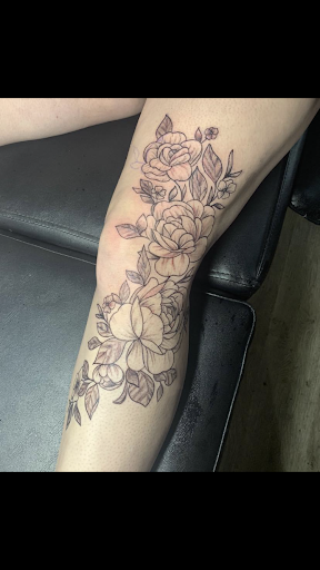 Explore feminine sleeve tattoo ideas, creative tattoo ideas in Bowling Green, available at Ink Therapy and Body Piercing