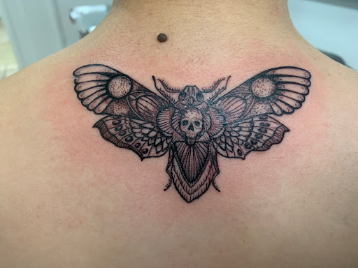 Explore song lyric tattoo ideas, creative tattoo ideas in Tampa, available at Angel Tattoo