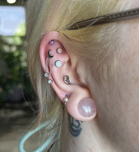 Find best travel tattoo ideas for your next unique tattoo in Albuquerque at Evolution Body Piercing