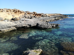 Spiaggia di Posto Li Sorci'in fotoğrafı doğal alan içinde bulunmaktadır