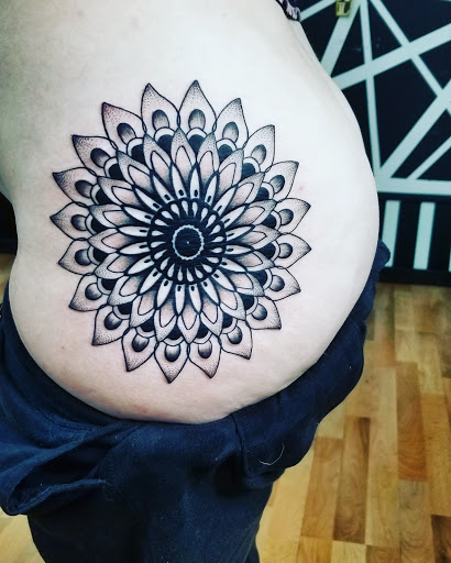 Explore michigan wolverines tattoo ideas, creative tattoo ideas in Benton, available at Spectrum Tattoo