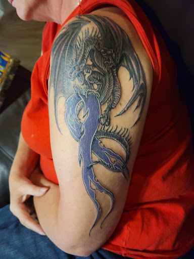 Explore scarface tattoo ideas, creative tattoo ideas in Peoria, available at Top Rocker Tattoo