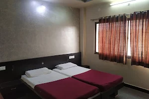 SPOT ON 60208 Hotel Ashoka Deluxe Lodging And Restaurant image