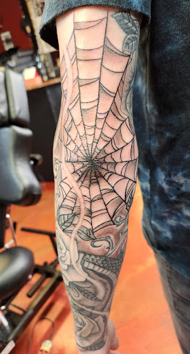 Explore honeybee tattoo ideas, creative tattoo ideas in Inverness, available at The Perfect Spot Tattoos