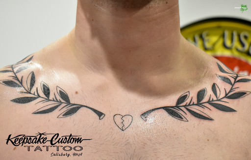 Explore hand tattoo ideas for men, creative tattoo ideas in Salisbury, available at Keepsake Custom Tattoo & Body Piercing Laser Tattoo Removal