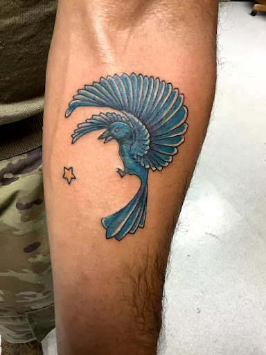 Explore paintbrush tattoo ideas, creative tattoo ideas in Turner, available at Heathen Ink