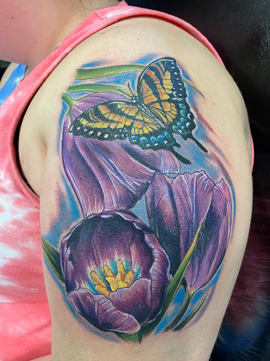 Explore shoulder tattoo idea, creative tattoo ideas in Easley, available at Amber Island Tattoo