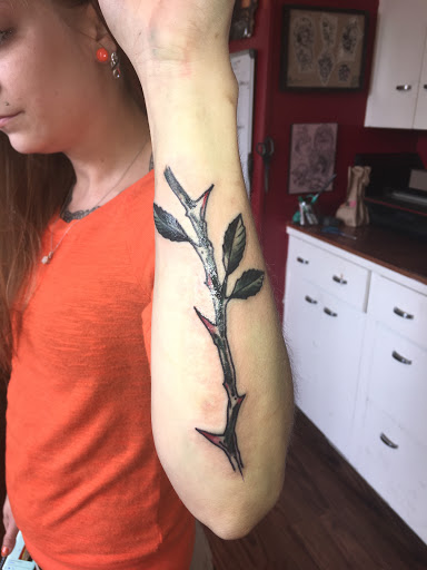 Explore upper arm tattoo ideas, creative tattoo ideas in Milford, available at Golden Hammer Tattoo Studios