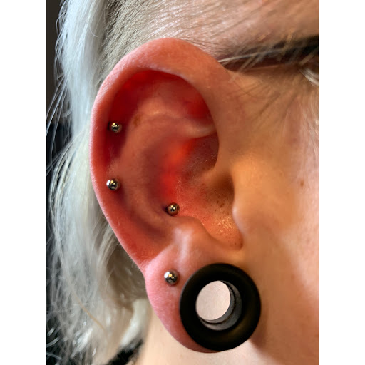 Explore hand tattoo ideas for females, creative tattoo ideas in Long Beach, available at Baron Art Tattoo & Piercing Studio Long Beach