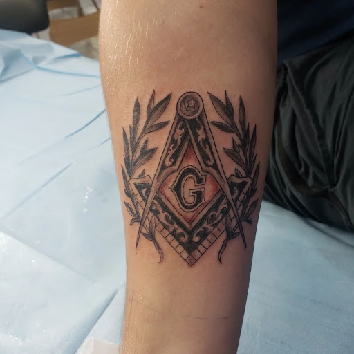 Explore mens behind the ear tattoo ideas, creative tattoo ideas in Houston, available at 333 Tattoo Studio HTX