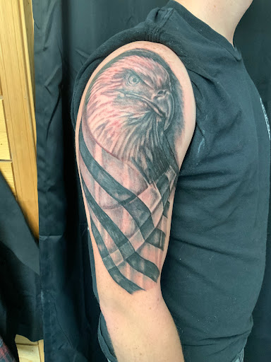 Explore american flag tattoos ideas, creative tattoo ideas in Wentzville, available at Ultimate Art Form Tattoo Studio