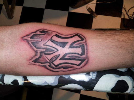 Explore swirl tattoo ideas, creative tattoo ideas in Columbia, available at Nyce Tattoos