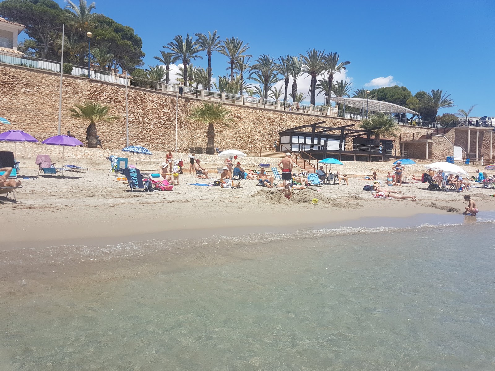 Foto van Playa Punta Prima met hoog niveau van netheid