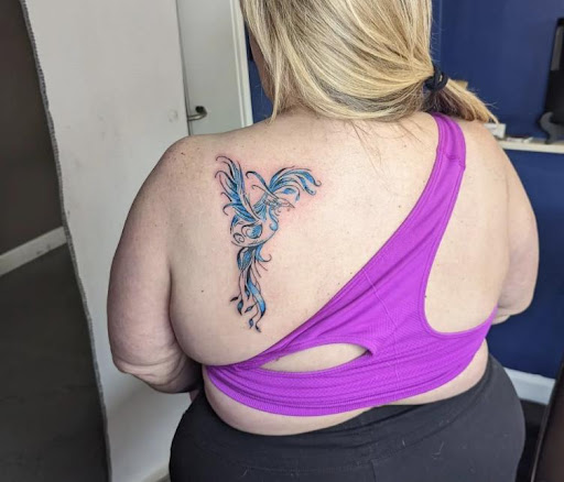 Explore women's quarter sleeve tattoo ideas, creative tattoo ideas in Denver, available at Mile High Ink