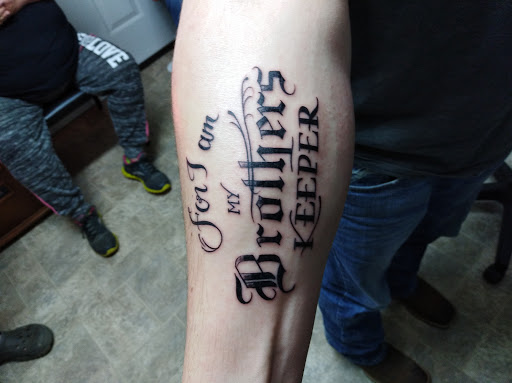 Explore blessing tattoo ideas, creative tattoo ideas in Lufkin, available at Blue Lotus Tattoo & Piercing