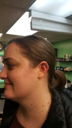 Explore tattoo ideas for women's lower back, creative tattoo ideas in Ogden, available at Unhinged Tattoos & Piercing